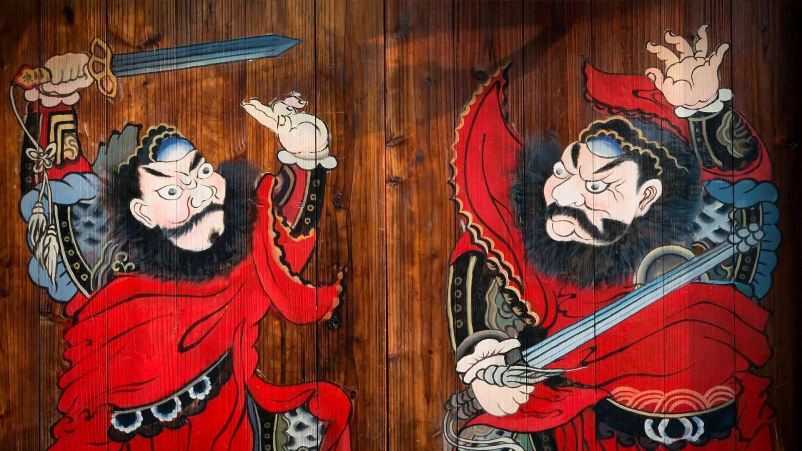 必应壁纸 2017年1月29日 月河古镇一户人家门前画着的门神，浙江